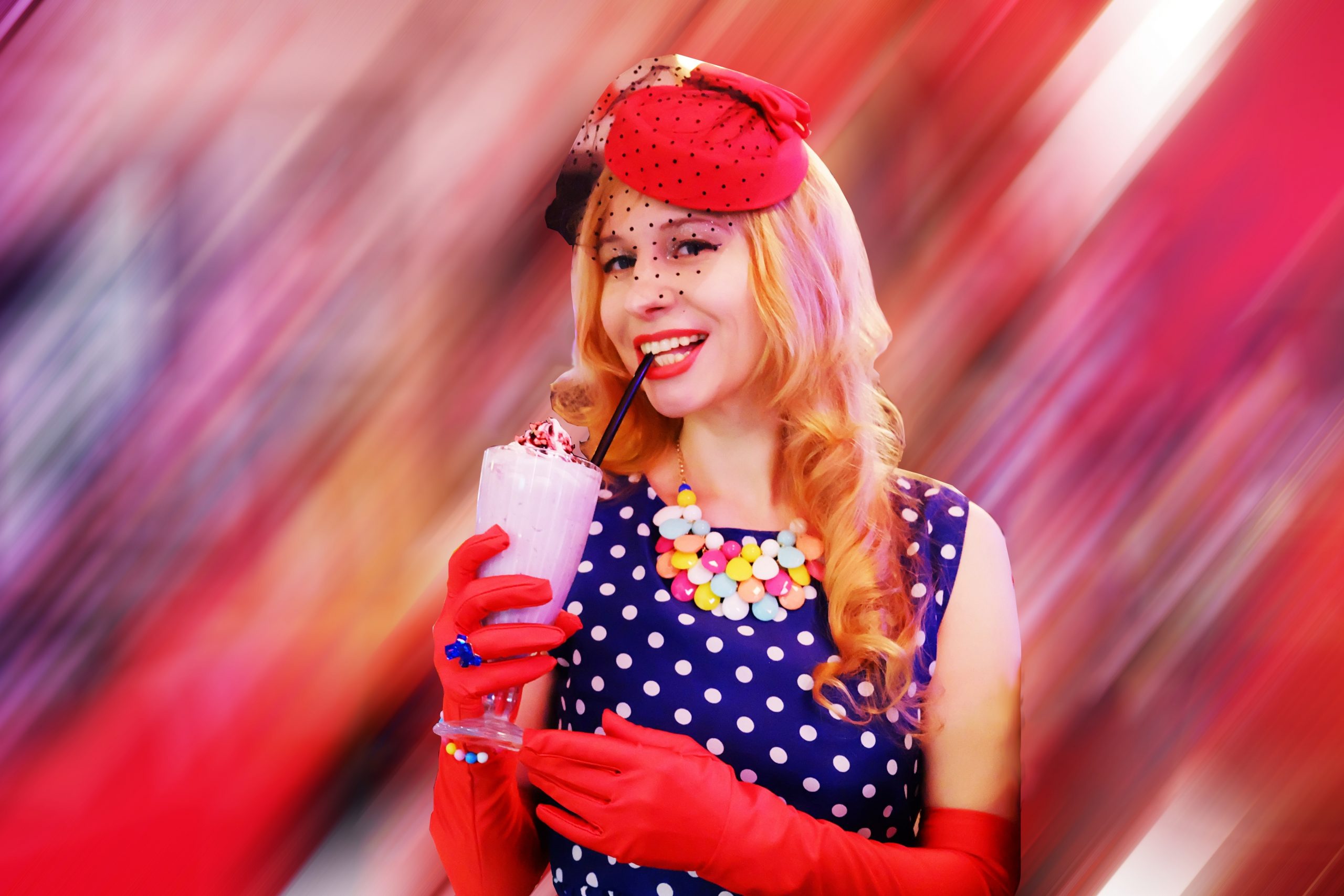 dressed up girl with milkshake