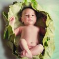 newborn in greens